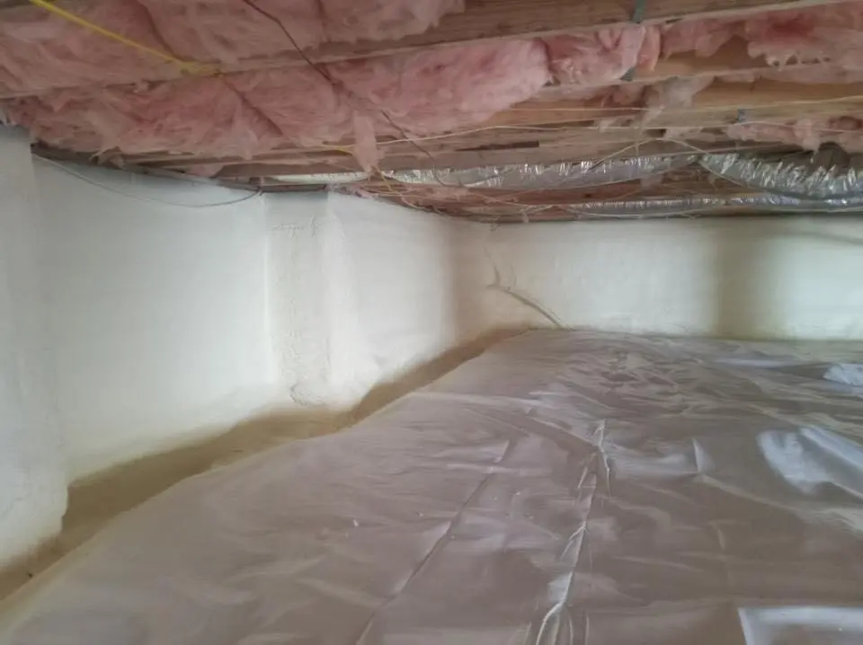 Crawl space encapsulation with closed-cell spray foam for Commercial Roof Restoration in Durham